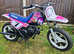 Yamaha PW50. Very little use. With training wheels. Can deliver. White Pink