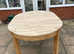 Extending round dining table