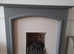 Fire place and surround. Solid stone. Electric fire. Wood painted mantle