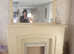 Lovely wooden fireplace with overmantle mirror