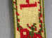 A Personalised Tapestry Bookmark with the name Helen.