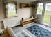 **Caravan with patio doors & walk-in wardrobe cheap**