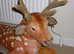 Life size soft toy deer in a "laying down position".,.