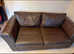 Brown leather sofa bed
