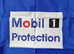 Mobil 1 Oil Rare Discontinued Reusable Seat Cover Blue, Red Stitched Piping