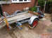 2 wheel galvernized trailer with winch and folding ramps..