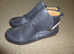 Cute leather ankle boots, grey with tan straps.