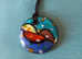 Three beautiful murano pendants with cord necklace