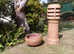 Large Vintage Louvred Chimney Pot in good condition  together with a round terracotta planter