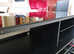 TV/HiFi Cabinet in black with glass top and front drawer - excellent condition