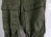 A Pair of Ex-x Forces Green Cargo Trousers Size: Small.