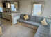 **Brand new caravan just off a12 on a park with fishing lakes and outdoor pool**