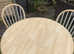 Solid pine  round kitchen table and 4 spindle back chairs
