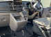 Wheelchair adapted vehicle with electric turney  seat