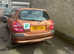 Nissan Almera, 2000 (X) orange hatchback, Automatic Petrol, 30,000 miles